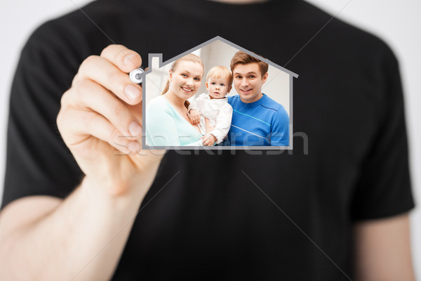 family with child and dream house Stock photo © dolgachov