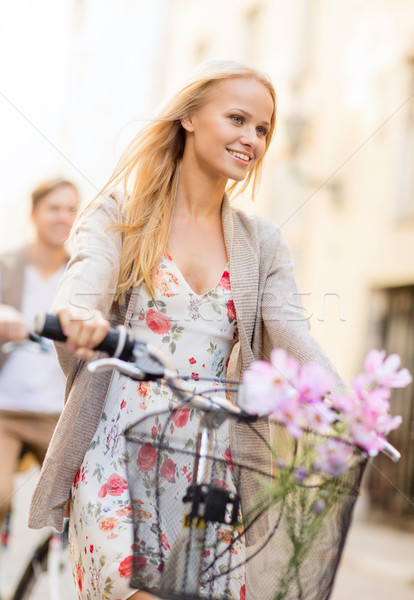 Pareja bicicletas ciudad verano vacaciones bicicletas Foto stock © dolgachov