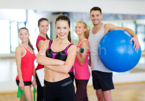 Nő áll csoport tornaterem fitnessz sport Stock fotó © dolgachov