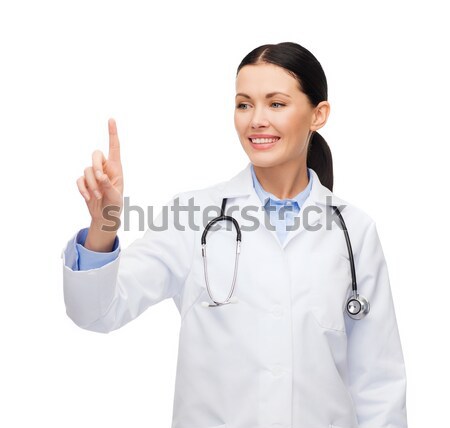 Foto stock: Sonriendo · femenino · médico · senalando · algo · salud