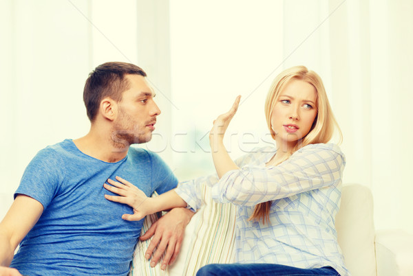 unhappy couple having argument at home Stock photo © dolgachov