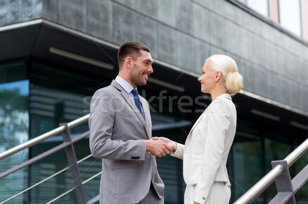 Lächelnd Geschäftsleute Händeschütteln Straße Business Partnerschaft Stock foto © dolgachov