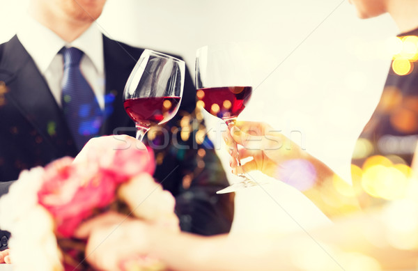 engaged couple with wine glasses Stock photo © dolgachov