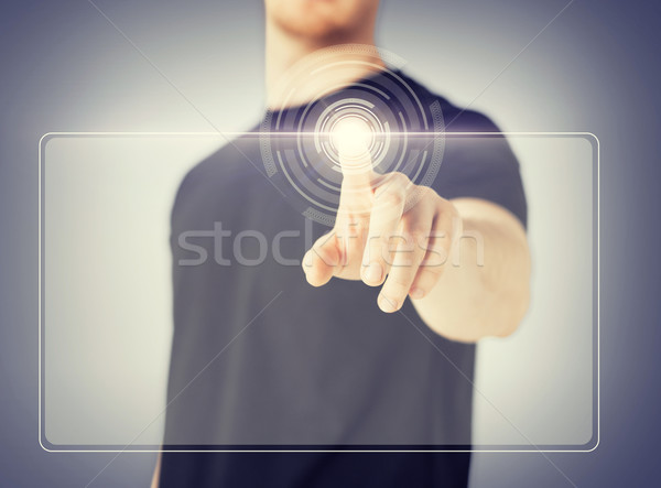 Erkek el dokunmak sanal ekran Stok fotoğraf © dolgachov