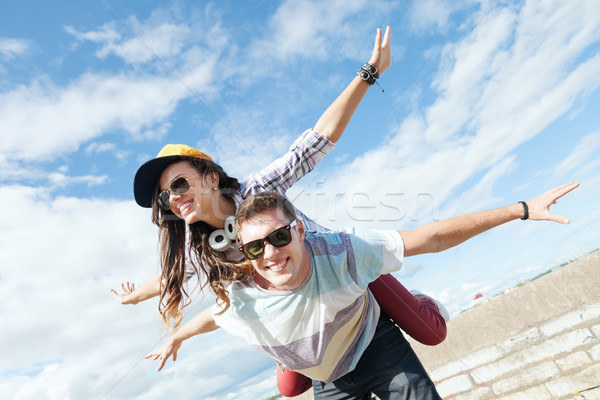 teenagers having fun outside Stock photo © dolgachov