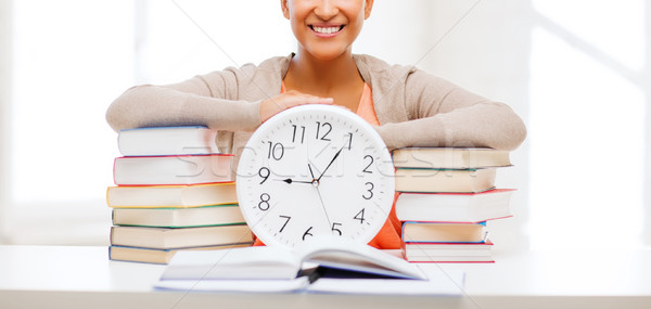 attractive woman with white clock Stock photo © dolgachov