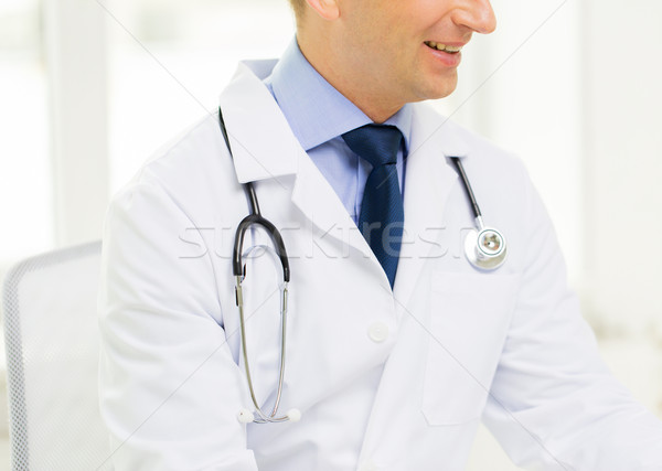 close up of male doctor at office in hospital Stock photo © dolgachov