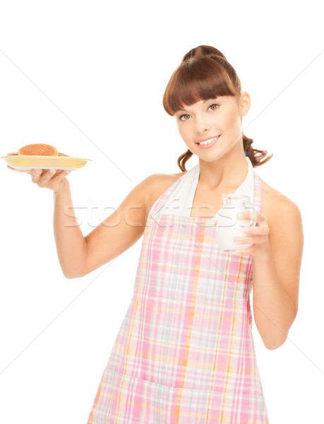 housewife with milk and cookies Stock photo © dolgachov