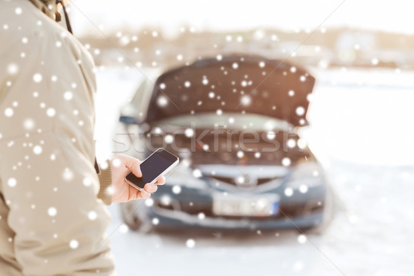 [[stock_photo]]: Homme · voiture · cassée · smartphone · transport · hiver