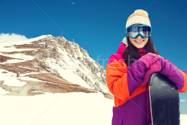 Mutlu genç kadın snowboard dağlar kış boş Stok fotoğraf © dolgachov