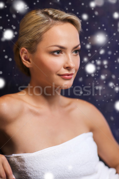 beautiful woman sitting in bath towel at sauna Stock photo © dolgachov