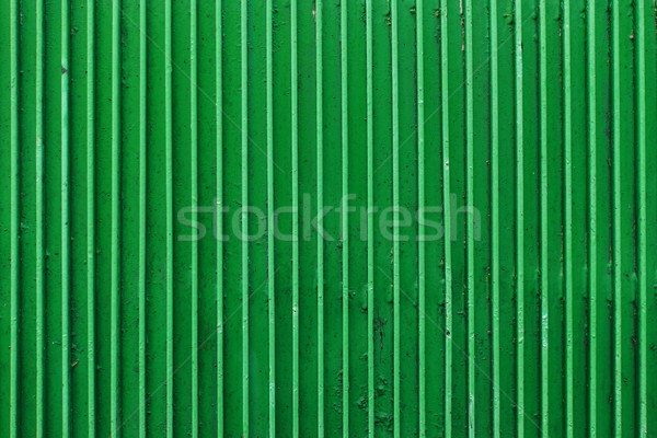 old green painted metal ribbed surface Stock photo © dolgachov