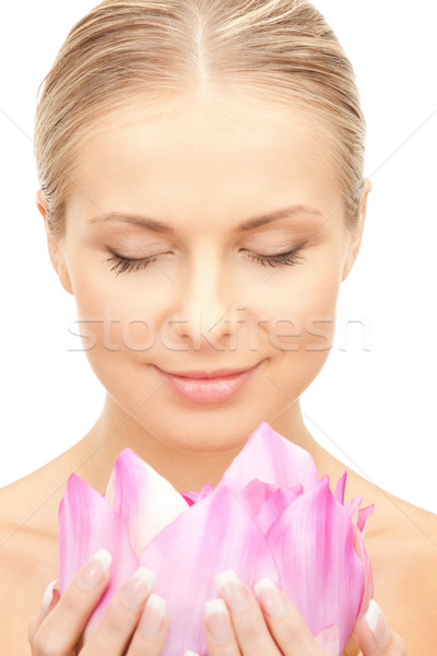 beautiful woman with lotus flower Stock photo © dolgachov