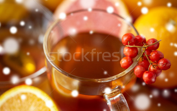 close up of tea cup with rowanberry Stock photo © dolgachov