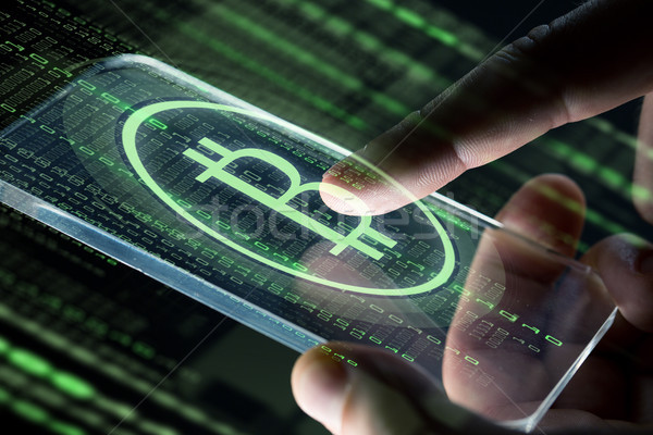 Handen smartphone bitcoin business toekomst Stockfoto © dolgachov