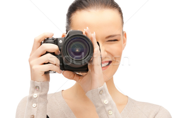 teenage girl with digital camera Stock photo © dolgachov