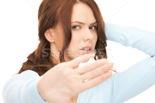 woman making stop gesture Stock photo © dolgachov