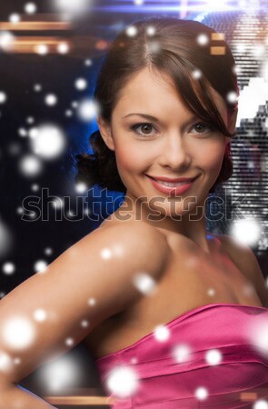 Stock photo: happy and smiling teenage girl with city lights
