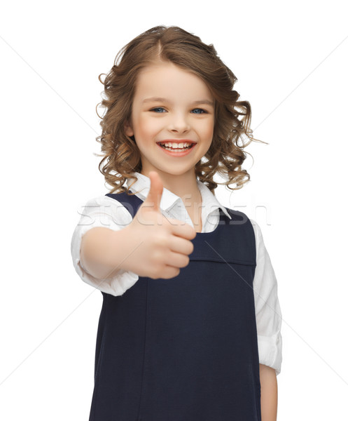 pre-teen girl showing thumbs up Stock photo © dolgachov