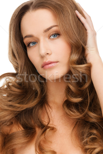 Gyönyörű higgadt nő hosszú göndör haj báj Stock fotó © dolgachov