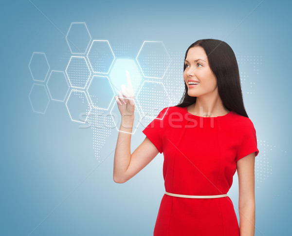 Mujer vestido rojo virtual Screen anuncio futuro Foto stock © dolgachov