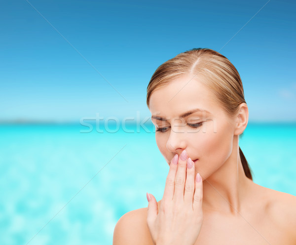 young woman doing hush gesrute Stock photo © dolgachov