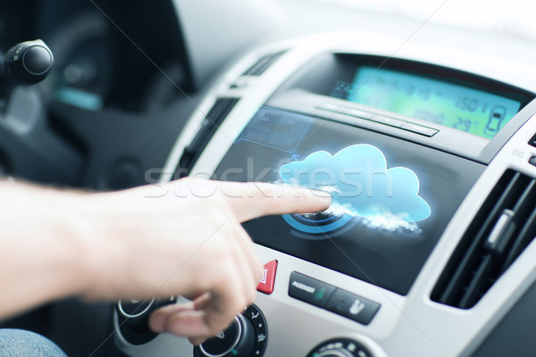 man using car control panel Stock photo © dolgachov