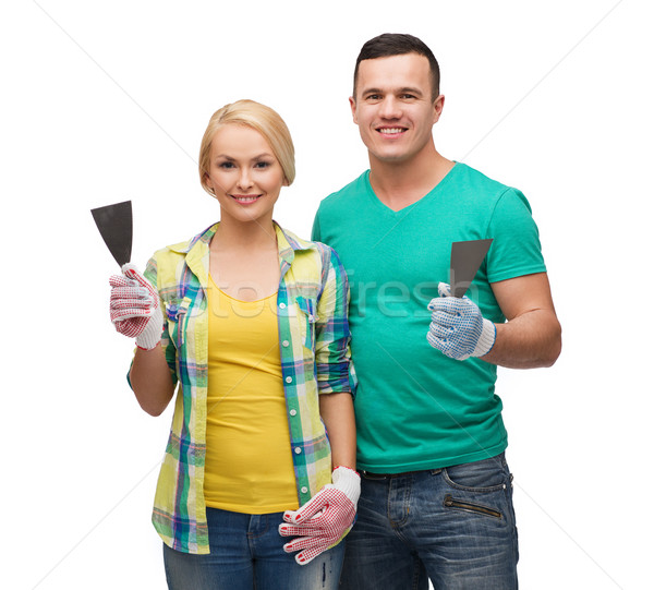 Foto stock: Sonriendo · Pareja · guantes · espátula · reparación · construcción