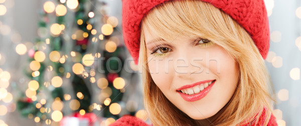 close up of smiling young woman in winter clothes Stock photo © dolgachov