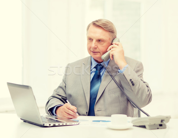ストックフォト: 忙しい · ビジネスマン · ノートパソコン · 電話 · ビジネス