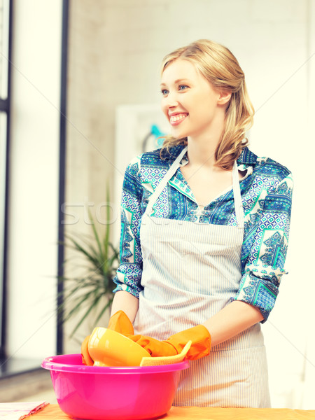 housewife washing dish at the kitchen Stock photo © dolgachov