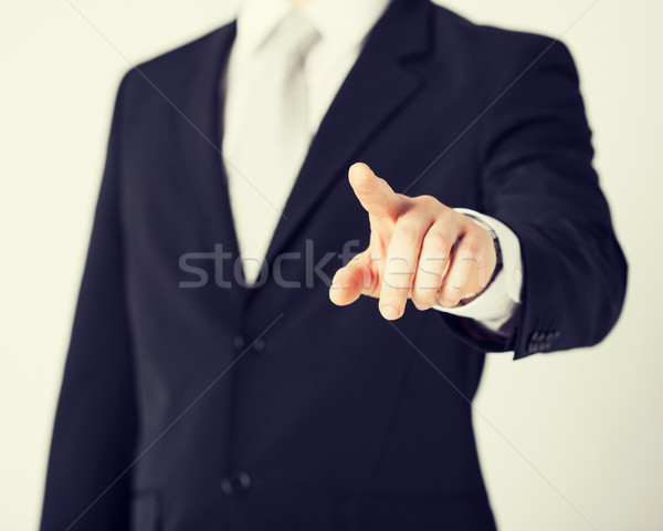 Stock photo: man hand pointing at something