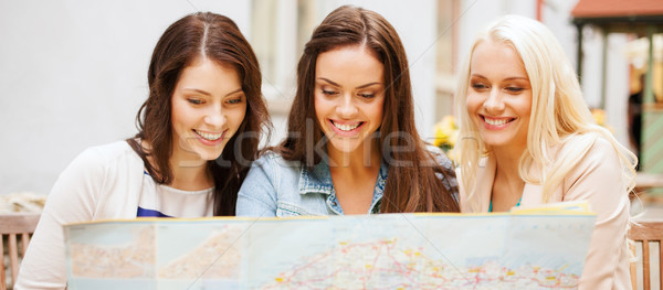 [[stock_photo]]: Belle · filles · regarder · touristiques · carte · ville