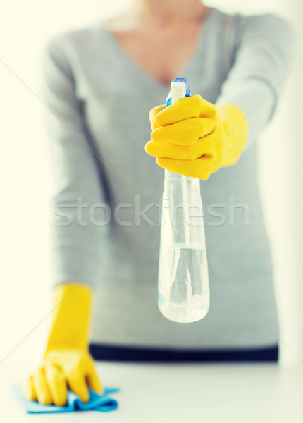 close up of woman cleaning table with cloth Stock photo © dolgachov