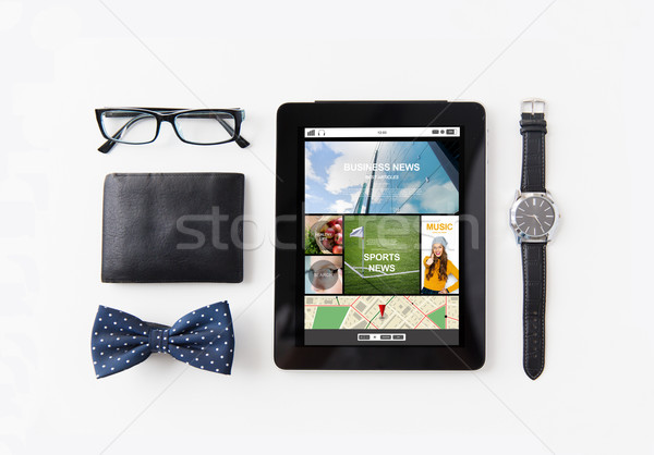 tablet pc with web applications and personal stuff Stock photo © dolgachov