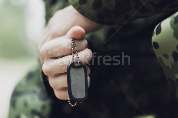 close up of young soldier in military uniform Stock photo © dolgachov