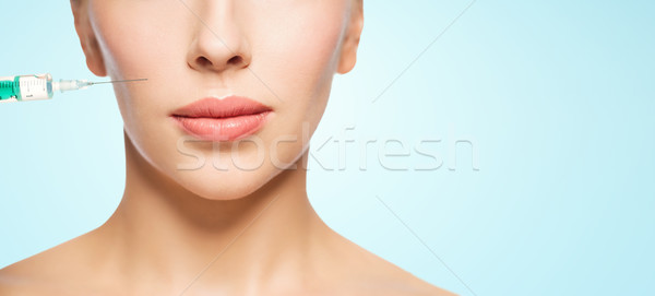 Twarz kobiety strzykawki wstrzykiwań ludzi chirurgia plastyczna Zdjęcia stock © dolgachov