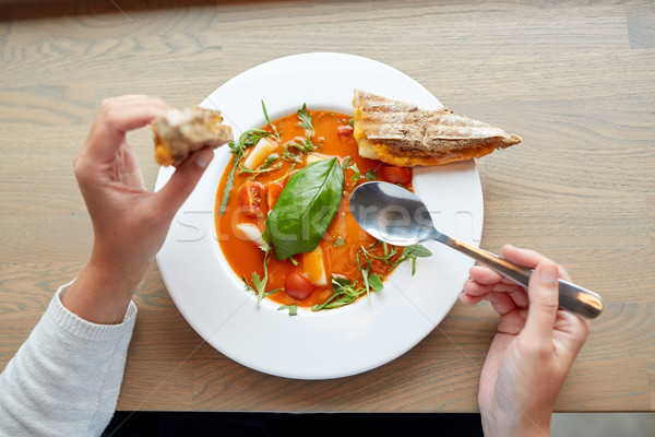 woman eating gazpacho soup at restaurant Stock photo © dolgachov