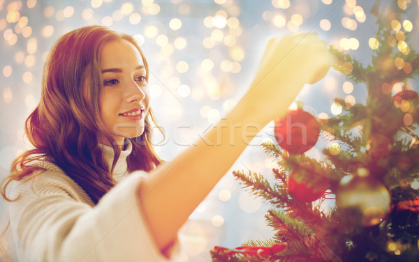 Boldog fiatal nő karácsonyfa karácsony tél ünnepek Stock fotó © dolgachov