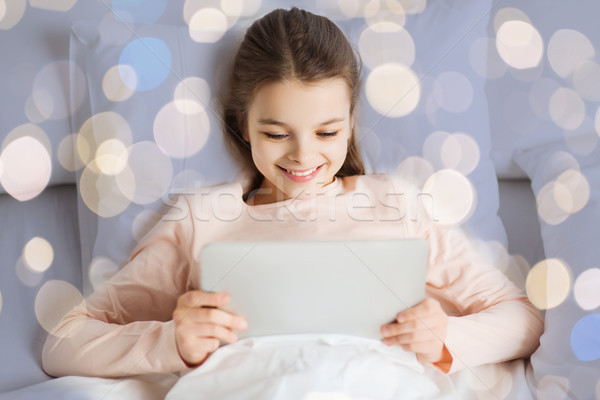 幸せな女の子 ベッド ライト 人 子供 ストックフォト © dolgachov