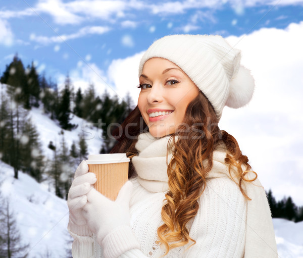 woman in hat with takeaway tea or coffee cup Stock photo © dolgachov