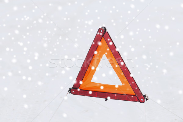 closeup of warning triangle on snow Stock photo © dolgachov