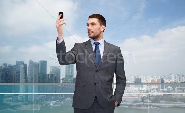 Jeunes affaires smartphone ville affaires technologie [[stock_photo]] © dolgachov