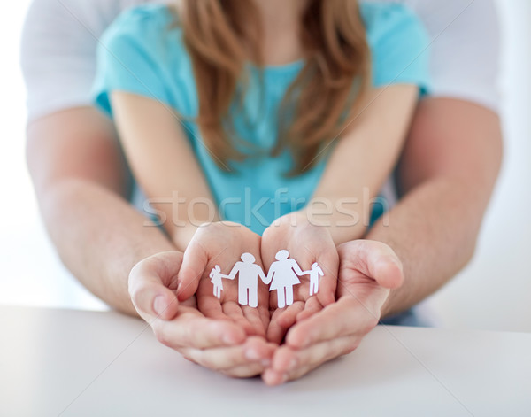 close up of man and girl with cupped hands at home Stock photo © dolgachov
