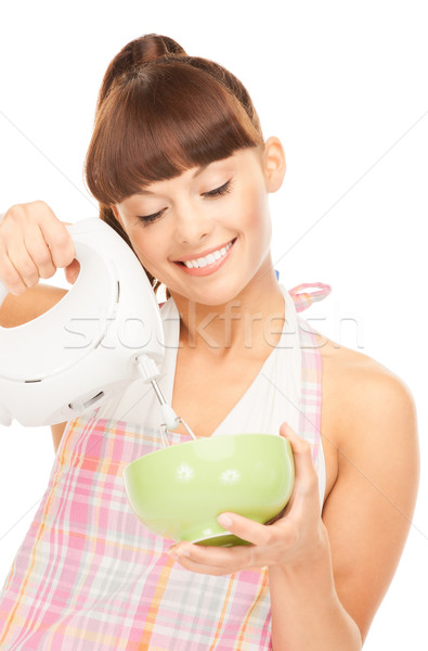 housewife with mixer Stock photo © dolgachov