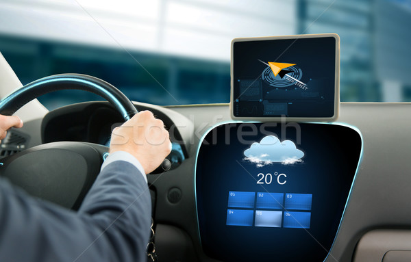 close up of businessman with tablet pc driving car Stock photo © dolgachov
