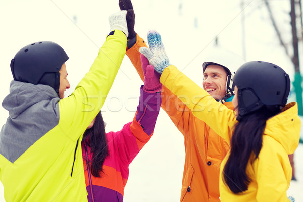 счастливым друзей high five зима Сток-фото © dolgachov