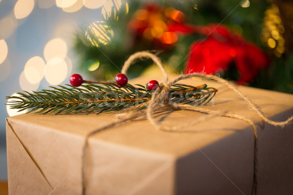 close up of christmas gift with fir branch Stock photo © dolgachov