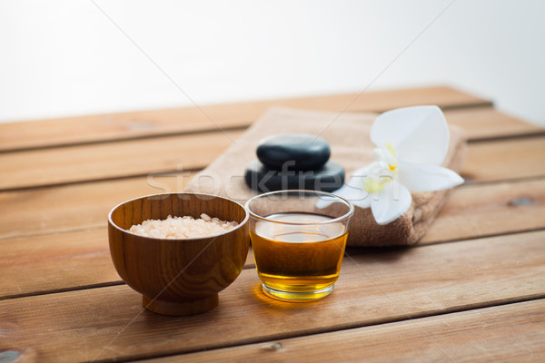 close up of pink salt with honey and bath stuff Stock photo © dolgachov