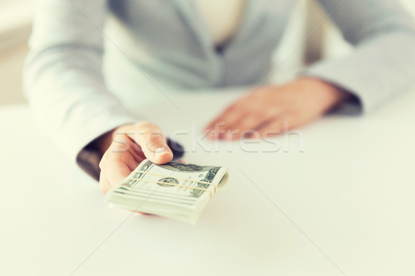 close up of woman hands holding us dollar money Stock photo © dolgachov